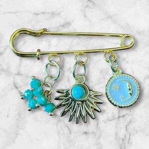 Gold Safety Pin with Blue Charms